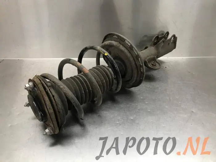 Schokdemperpoot links-voor Toyota Rav-4